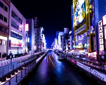 Try okonomiyaki, Osaka’s favorite food, in Dotonbori 