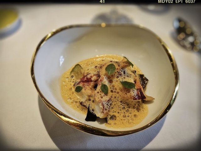 Sautéed lobster flavored with shrimp sauce